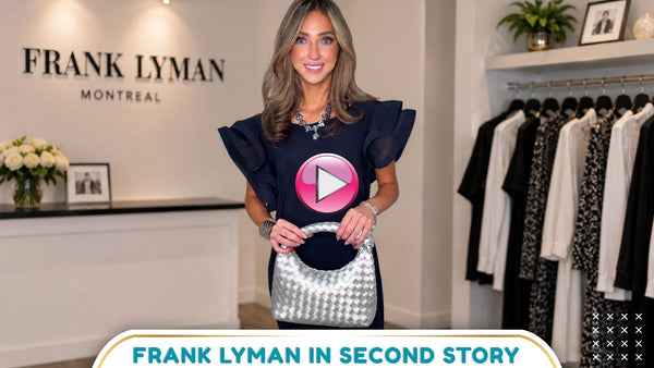 Model wearing an elegant Frank Lyman pleated blouse available at Second Story designer consignment in Albuquerque, New Mexico.