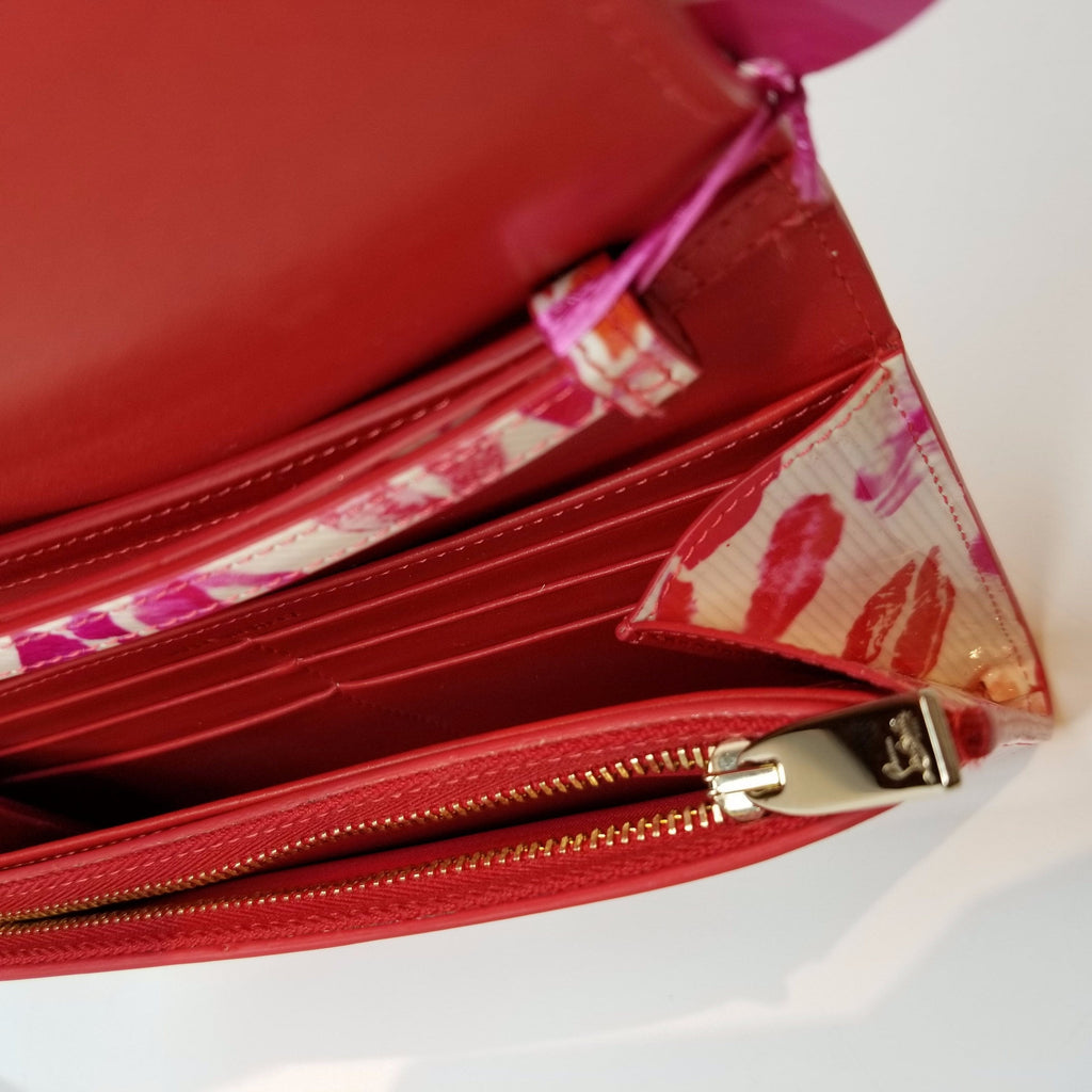 Louboutinwalletstudsandlipsatgeelorettaabq