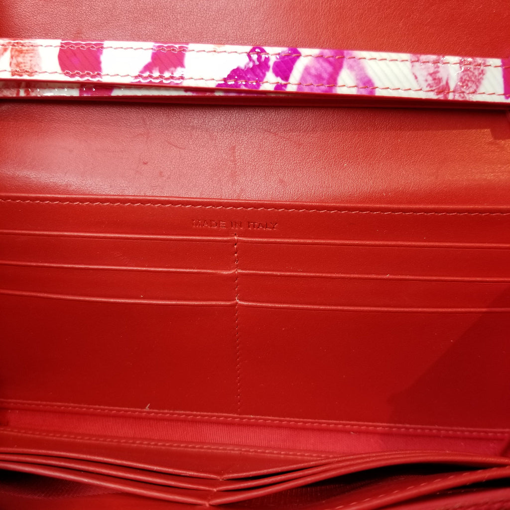 Louboutinwalletstudsandlipsatgeelorettaabq